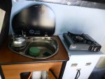 kitchen units fastened to floor and van side. two gas hobs.JPG